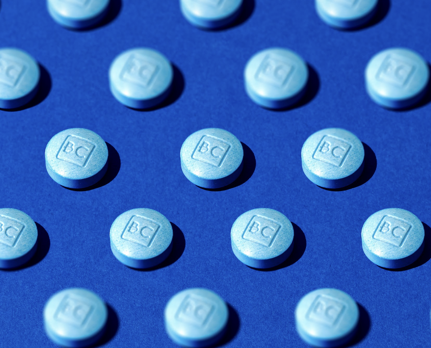 bluechew chewable tablets for erectile dysfunction laid out on blue background