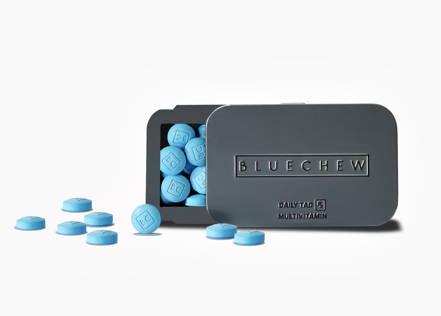 Open tin of BlueChew’s DailyTAD with tablets scattered, promoting Tadalafil and multivitamins for potential gym performance benefits.